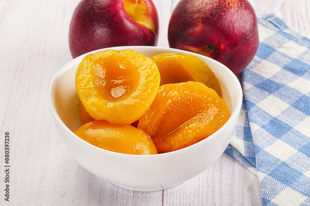 Canned peaches with sweet syrope Canned peaches with sweet syrope