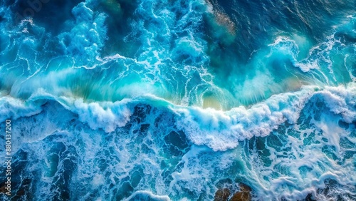 Top view on blue ocean waves. Nature background. © Matan