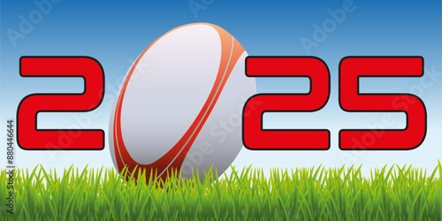 L’année 2025 avec un ballon de rugby posé sur la pelouse d’un terrain pour symboliser le lancement de la nouvelle saison de compétition.