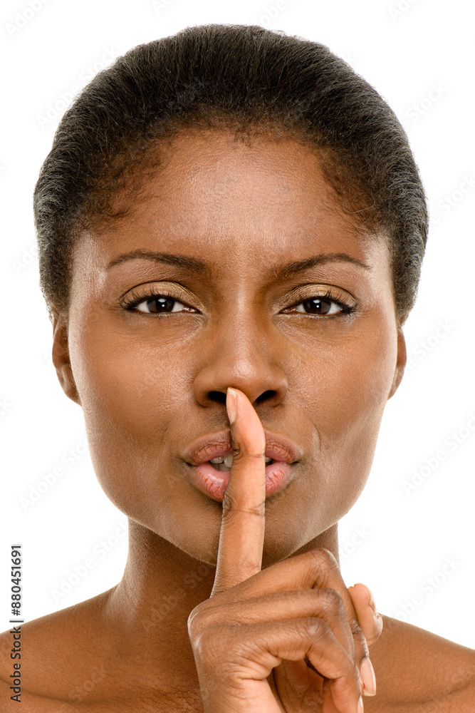 Portrait, hush and black woman in studio for secret, gossip or quiet on white background. Body, whisper and female person with hand on lips for privacy, confidential drama or silence gesture Portrait, hush and black woman in studio for secret, gossip or quiet on white background. Body, whisper and female person with hand on lips for privacy, confidential drama or silence gesture