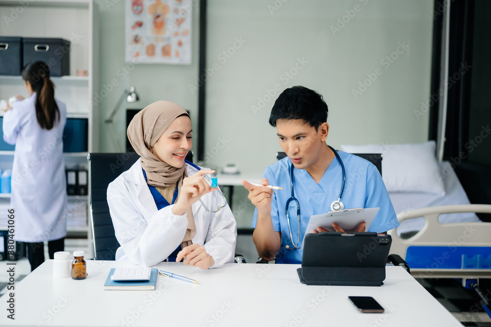Medical, meeting and doctors with laptop for research, planning and hospital schedule management. Health, professional and people team Medical, meeting and doctors with laptop for research, planning and hospital schedule management. Health, professional and people team