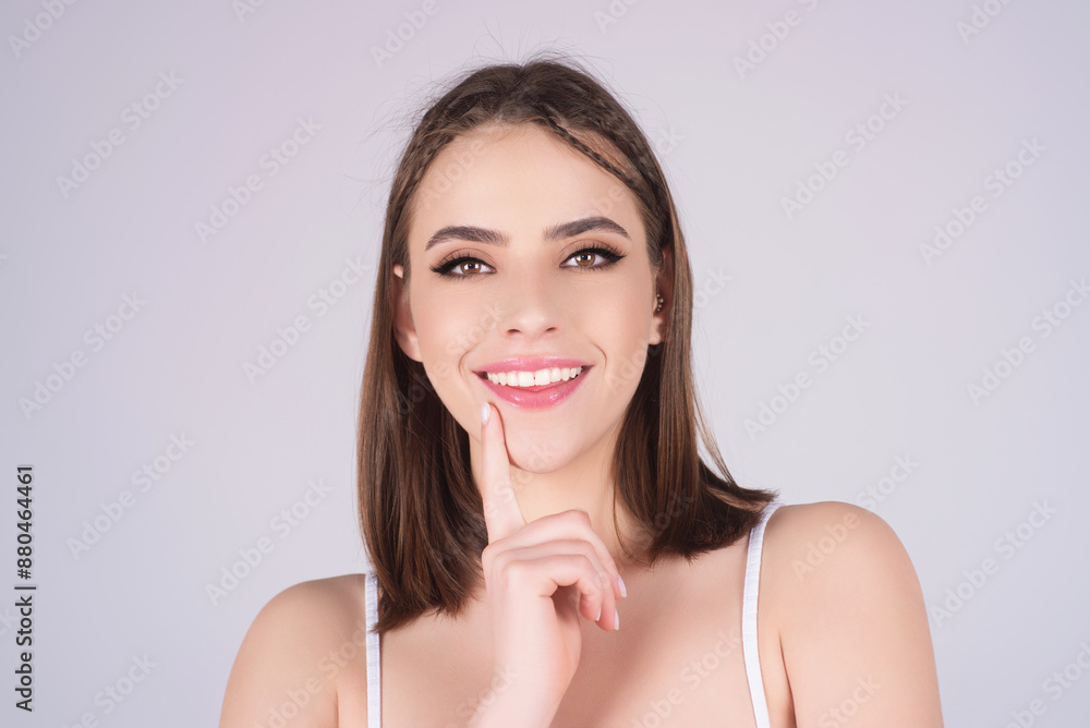Smiling face. Female face happy portrait. Close up portrait of young happy smiling girl. Young woman smiling with teeth, looking in camera with happy face expression. Smiling female portrait. Smiling face. Female face happy portrait. Close up portrait of young happy smiling girl. Young woman smiling with teeth, looking in camera with happy face expression. Smiling female portrait.