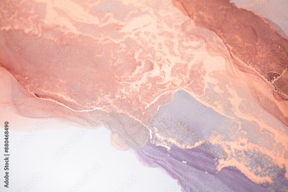 Naklejka premium An abstract painting with soft peach, lavender, and gold hues. The image shows a close-up view of the swirling colors and patterns