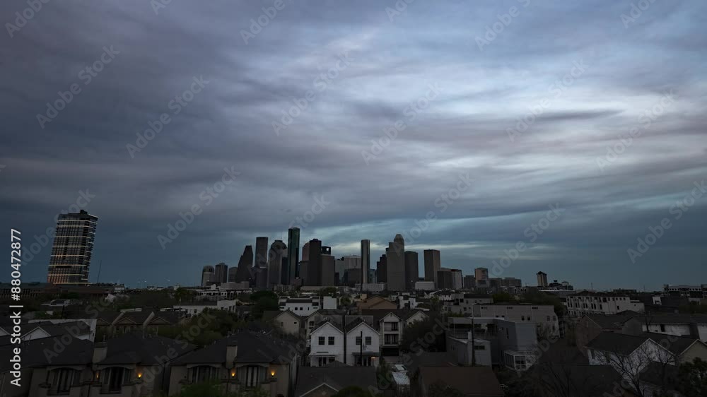Timelapse of Houston's skyline under shifting clouds, capturing the city's dynamic energy and urban sprawl in a mesmerizing play of light and shadow. Timelapse of Houston's skyline under shifting clouds, capturing the city's dynamic energy and urban sprawl in a mesmerizing play of light and shadow.