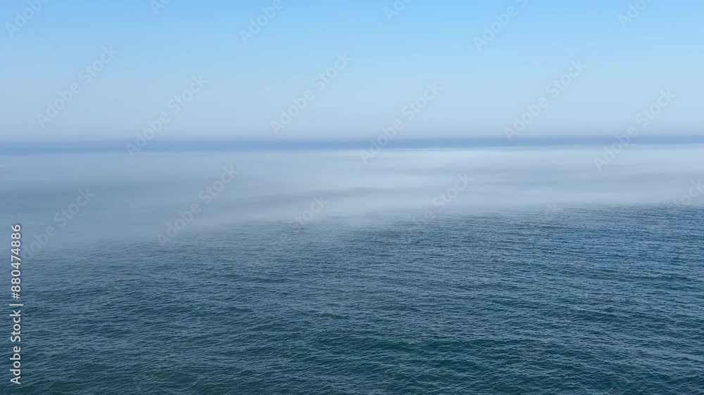 Misty steam above flowing sea water.