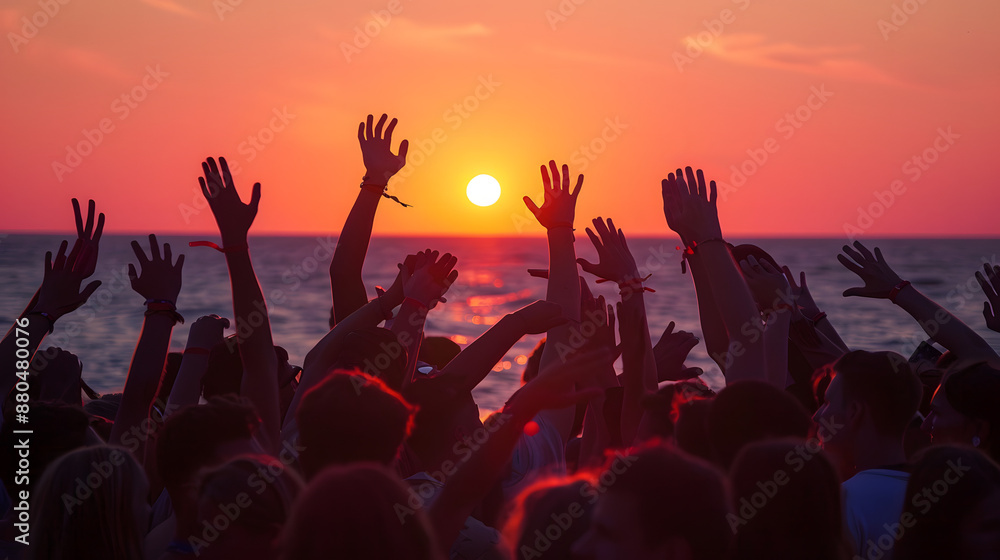 A group of teenagers stands, arms raised and waving joyfully towards the setting evening sun, capturing a moment of youthful exuberance and freedom against a backdrop of vibrant colors. A group of teenagers stands, arms raised and waving joyfully towards the setting evening sun, capturing a moment of youthful exuberance and freedom against a backdrop of vibrant colors.