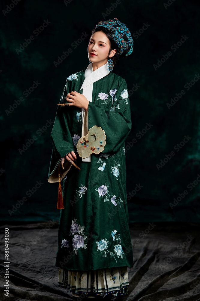 Asian,woman,showing,court,costumes,of,the,Qing,Dynasty,in,China Asian,woman,showing,court,costumes,of,the,Qing,Dynasty,in,China