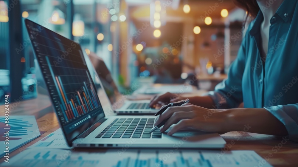 Data on laptop and conversations with business women in office, training, communication, and a teamwork project with diversity. Data on laptop and conversations with business women in office, training, communication, and a teamwork project with diversity.