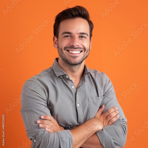 Smiling Man With Arms Crossed photo