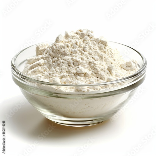 A glass mixing bowl filled with flour isolated on 060 bowl, food, white, flour, isolated, rice, salt, healthy, ingredient, cereal, glass, closeup, organic, cooking, meal, raw, powder, diet, milk, sp