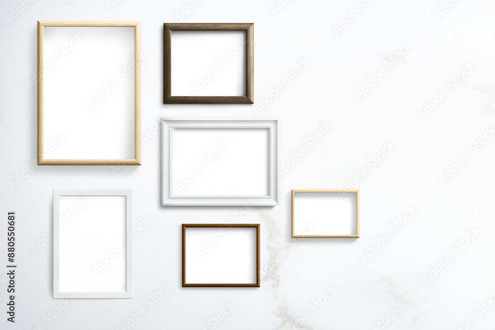 Various frame mockups hanging on a white wall Various frame mockups hanging on a white wall