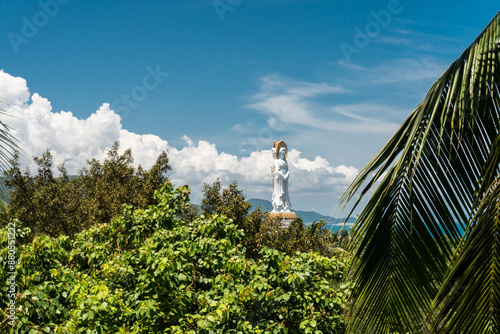 Beautiful scene of Guanyin statue at seaside in nanshan temple, hainan island , China