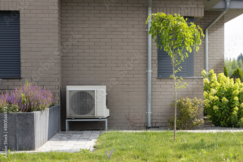 Outdoor Heat Pump on Brick Wall Background