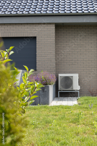 Energy-Efficient Heat Pump on Modern Brick House