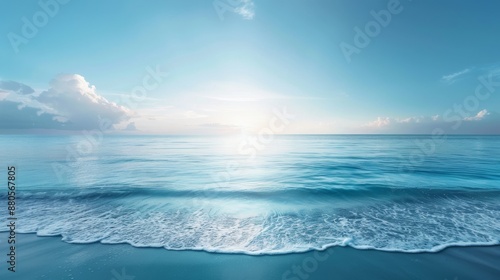 Serene ocean sunrise scene with gentle waves and clear blue sky, perfect for inspiring relaxation and peacefulness in any setting.