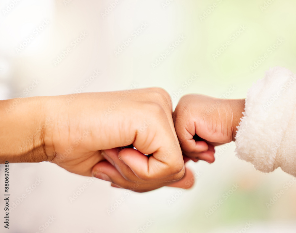 Hands, person and child with fist bump for greeting, caring and bonding together as family. People, mom and baby with gesture for support, unity and embrace relationship of parent with kid by closeup Hands, person and child with fist bump for greeting, caring and bonding together as family. People, mom and baby with gesture for support, unity and embrace relationship of parent with kid by closeup