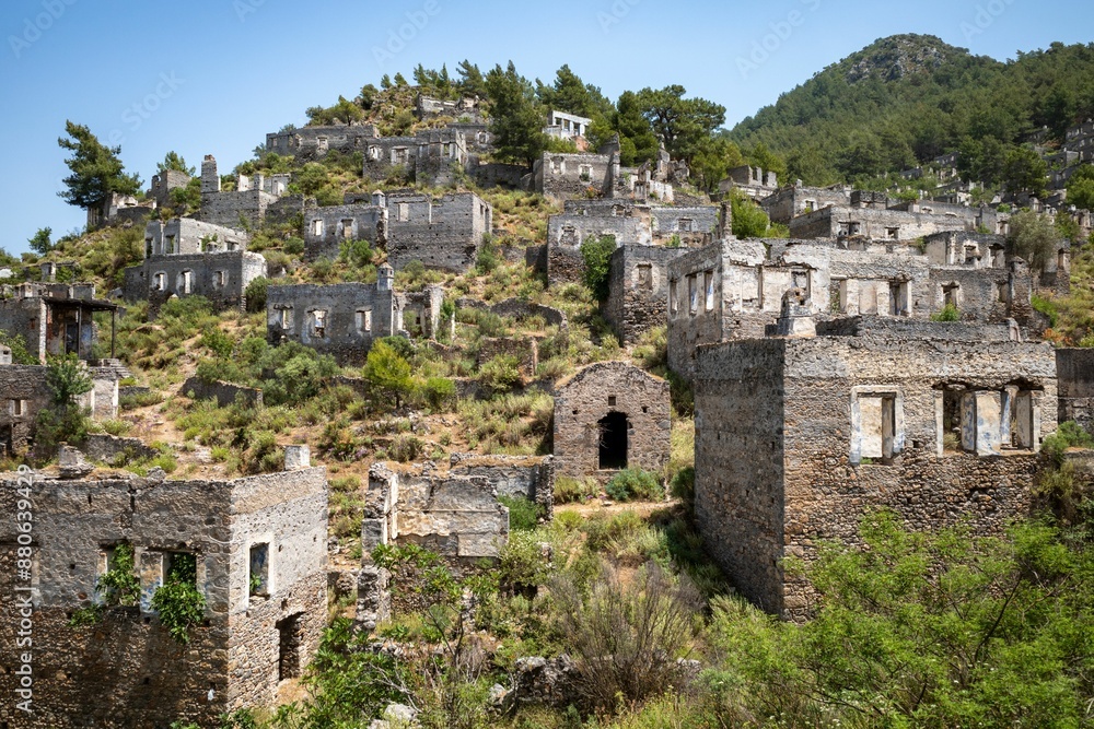 Ruins of the Abandoned Village of Kayakoy on a sunny day in Fethiye district, Mugla Province, Turkey Ruins of the Abandoned Village of Kayakoy on a sunny day in Fethiye district, Mugla Province, Turkey
