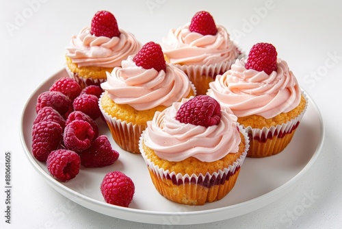 Elegant Raspberry Cream Filled Cupcakes on White Plate