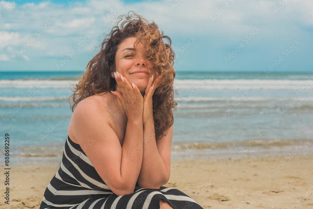 Brunette Latina woman resting at the beach, summer time vacation, Europe trip illustration, travelling content Brunette Latina woman resting at the beach, summer time vacation, Europe trip illustration, travelling content