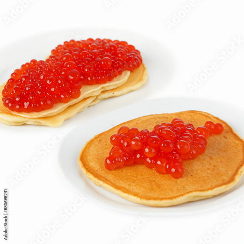 Delicious pancakes with red caviar,isolated on white background