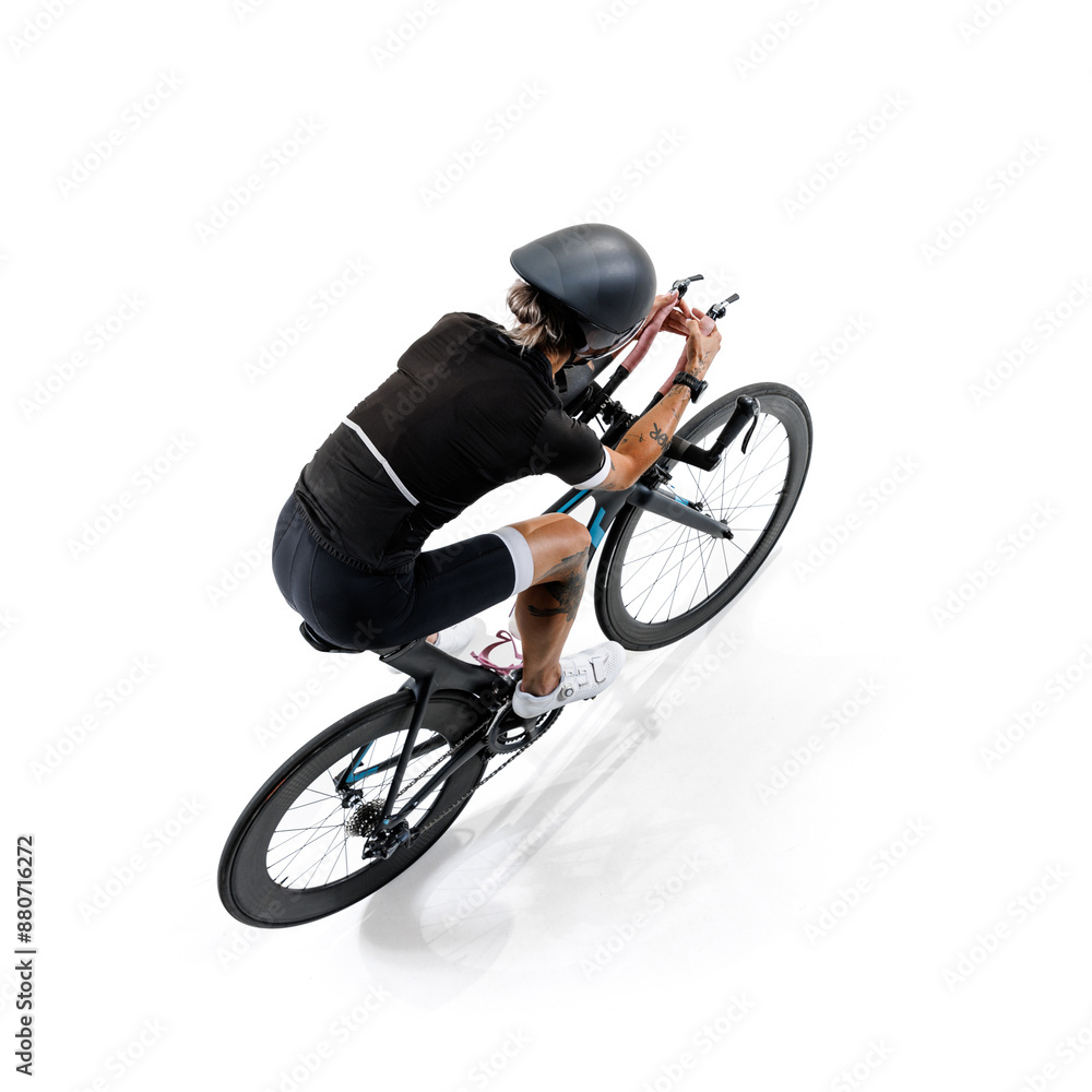 Obraz premium Cyclist, focused woman in black outfit and helmet riding road bike, viewed from above isolated on white background. Concept of sport, competition, tournament, speed, endurance, energy. Isometric view