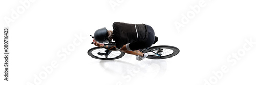 Top view of cyclist, woman with tattoos, wearing black cycling gear and helmet, riding modern racing bike isolated on white background. Concept of sport, competition, endurance, energy. Isometric view