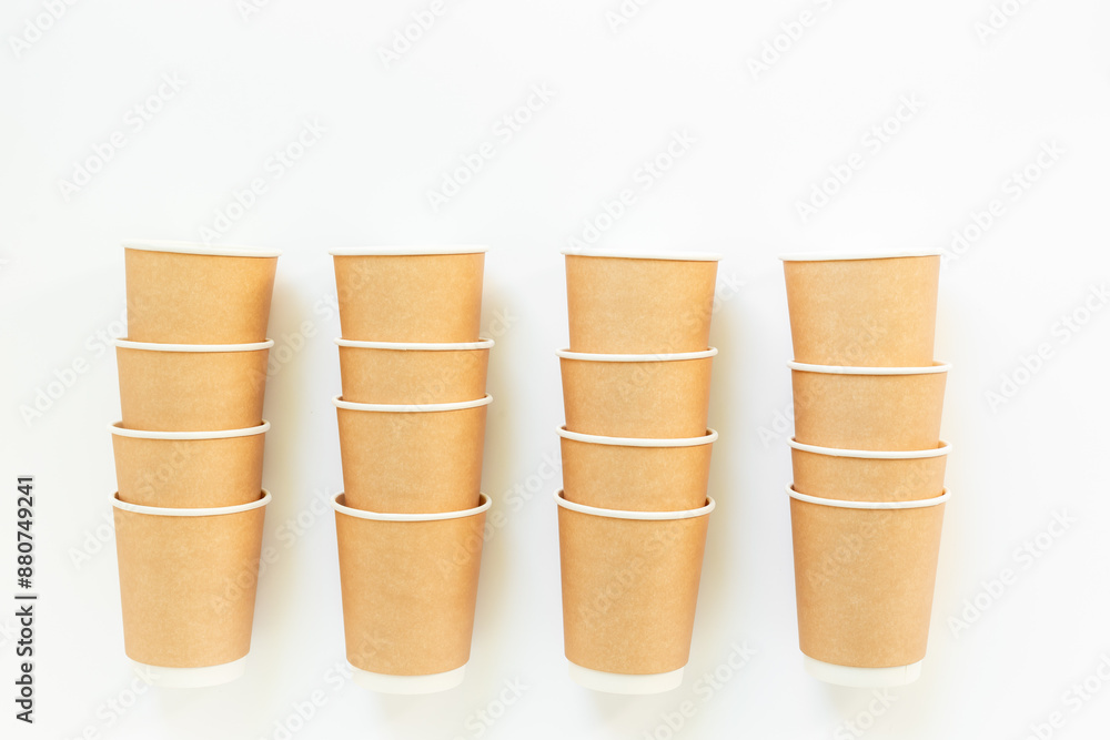 Stack of recyclable coffee paper cups, top view. Eco-friendly zero waste products Stack of recyclable coffee paper cups, top view. Eco-friendly zero waste products