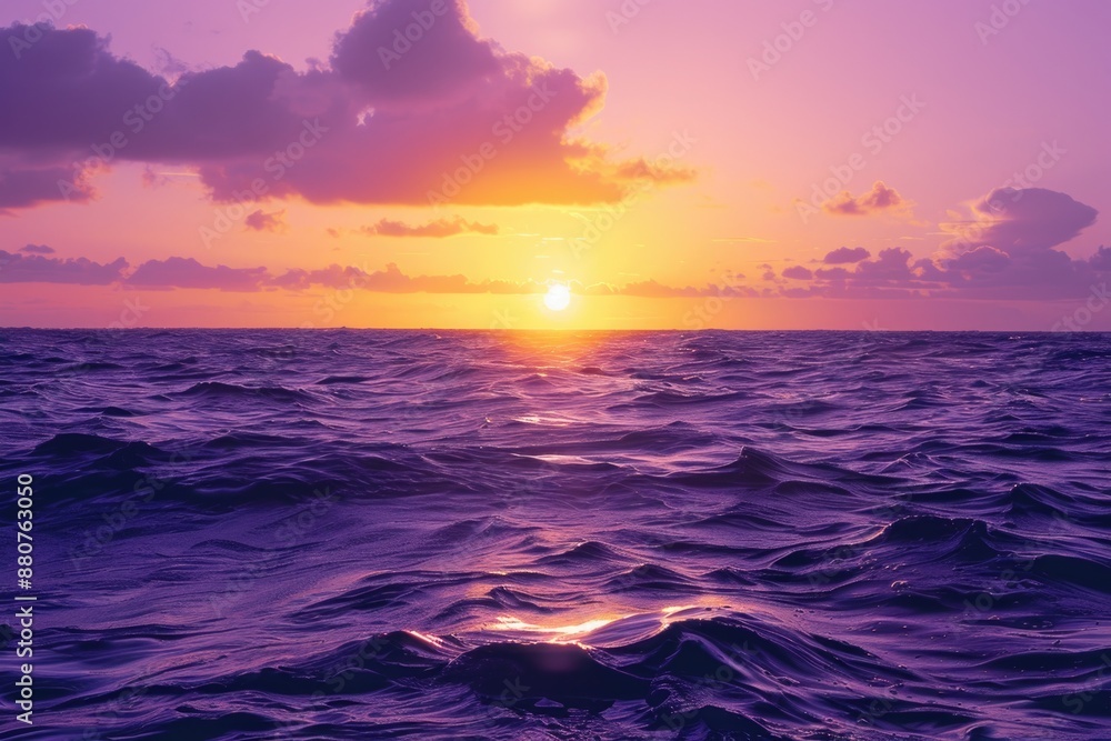 Obraz premium Yellow Sunrise. Beautiful Purple and Yellow Sunrise Over the Ocean with Cloudy Sky
