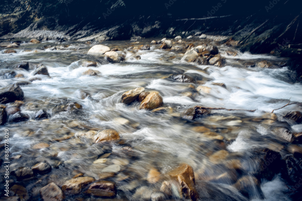 A shallow and stormy mountain river. A shallow and stormy mountain river.