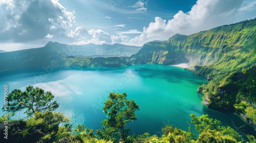 A vibrant turquoise lake nestled within a lush green volcanic crater