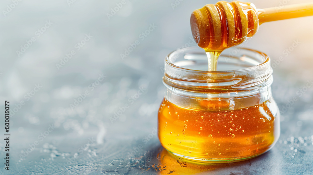 Honey Jar with Honey Dipper Drizzling Liquid Gold. Pure Organic Honey New Harvest Honey Jar with Honey Dipper Drizzling Liquid Gold. Pure Organic Honey New Harvest