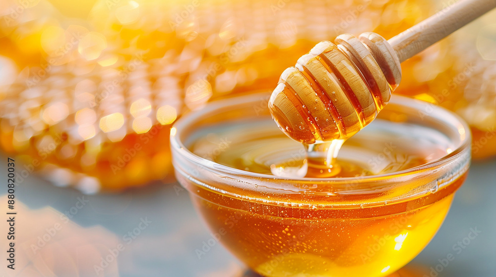 Organic Honey Close-Up with Honey Dipper. Pure Golden Honey in Glass Bowl Organic Honey Close-Up with Honey Dipper. Pure Golden Honey in Glass Bowl