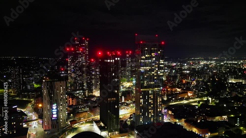 Wallpaper Mural Aerial View of Illuminated Greater Manchester Central City During Cloudy Night, Northwest of England,  United Kingdom. May 4th, 2024 Torontodigital.ca