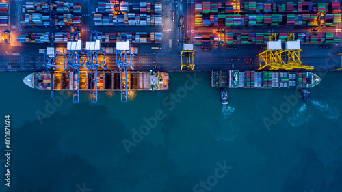 Aerial view container cargo ship at commercial sea port, Global business logistic import export transportation international by container cargo ship, Container cargo ship freight shipping at night.