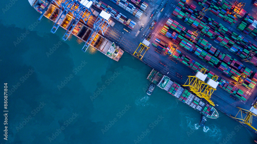 Aerial view container cargo ship at commercial sea port, Global business logistic import export transportation international by container cargo ship, Container cargo ship freight shipping at night.