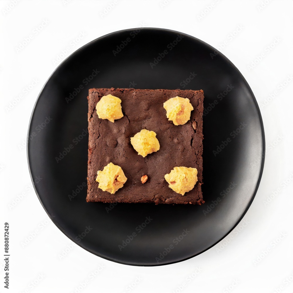 Brownies in a black plate isolated on white background Brownies in a black plate isolated on white background