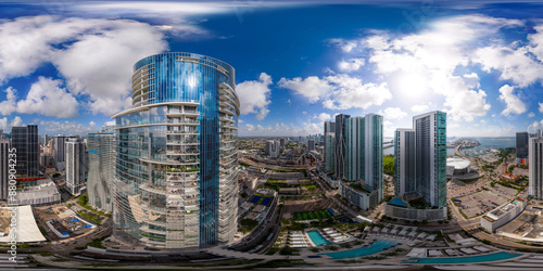 Aerial drone 360 equirectangular panorama. Downtown Miami highrise towers city landscape scene