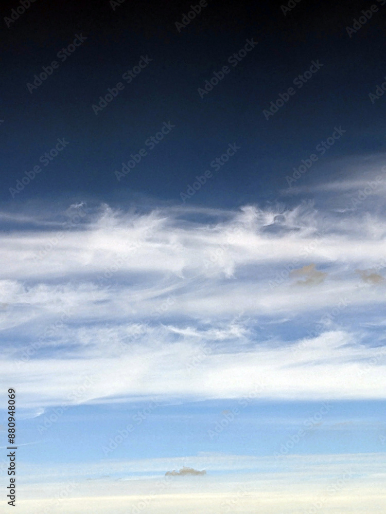 Obraz premium Fluffy White Clouds in a Blue Sky as A Skyscape Background