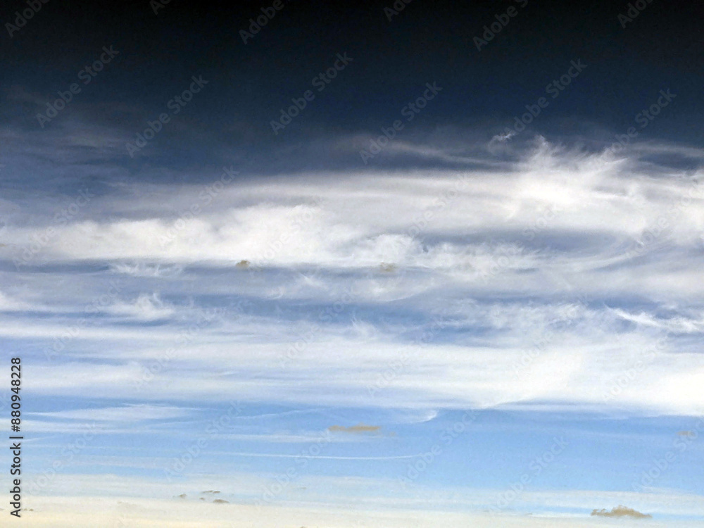 Fluffy White Clouds in a Blue Sky as A Skyscape Background Fluffy White Clouds in a Blue Sky as A Skyscape Background