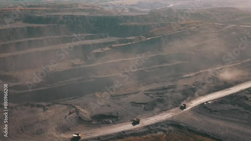 Russia Kuzbass. Aerial view of a large openpit mining operation with trucks transporting resources photo