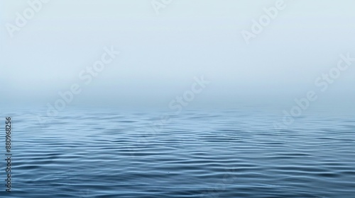 Calm Blue Ocean Surface with Gentle Ripples Under Misty Sky. Generative AI