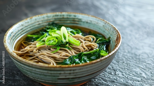 The national cuisine of Japan. Buckwheat noodles with spinach. photo