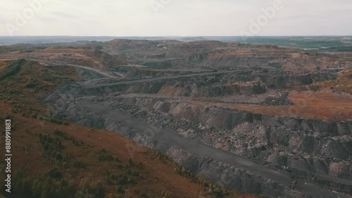 Aerial perspective of a vast openpit mining area showcasing industrial operations photo