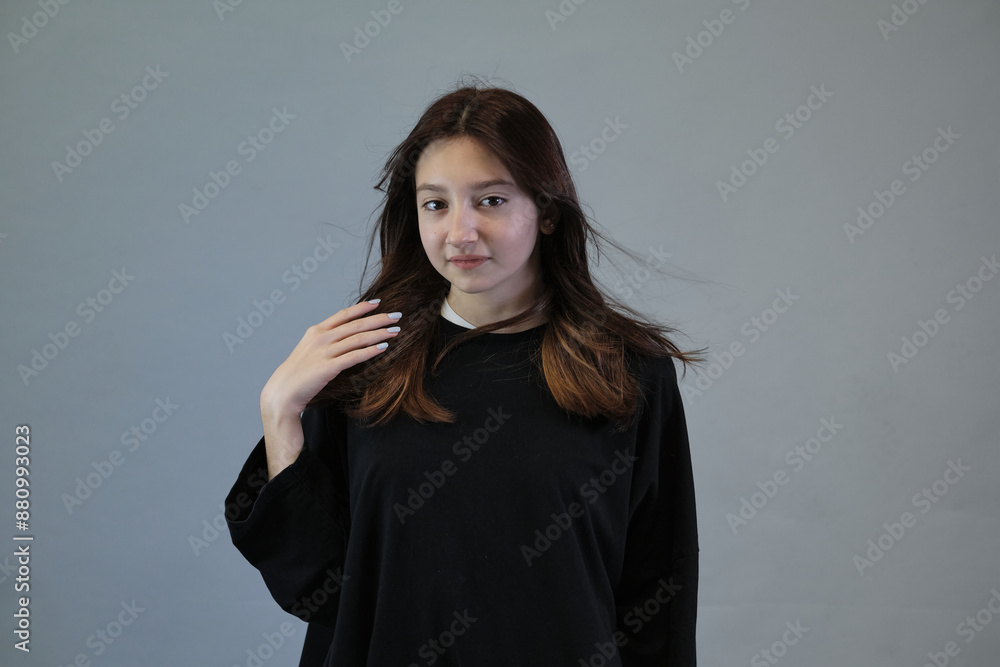 Young woman with tousled hair, giving a sense of motion. Depicts the dance of life and vitality of the human spirit. Young woman with tousled hair, giving a sense of motion. Depicts the dance of life and vitality of the human spirit.