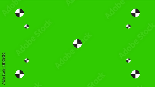 Green screen background, VFX motion tracking markers. Art design green screen backdrop template. Abstract concept video footage replacement tracking markers element. photo