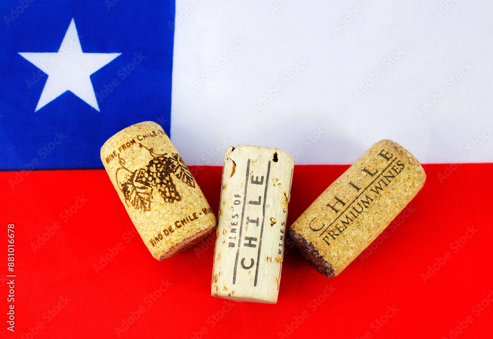 Fototapeta premium Three corks of different wines on the flag of Chile