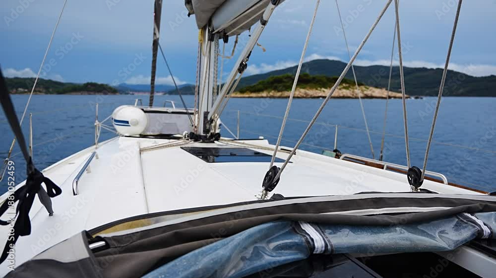 Yacht sailing near Croatia coast. Close-up view of the deck, mast and sails. Yachting concept Yacht sailing near Croatia coast. Close-up view of the deck, mast and sails. Yachting concept