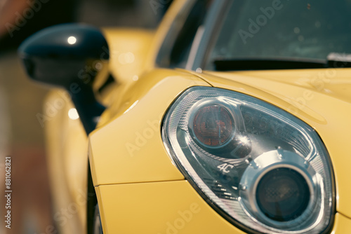 vintage classic retro car bright yellow color back front view of mirror and headlight