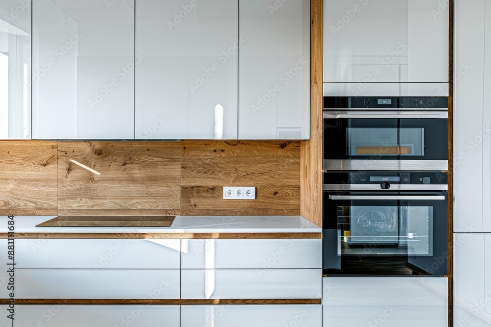 Modern white and wooden kitchen with sleek cabinets and integrated appliances Modern white and wooden kitchen with sleek cabinets and integrated appliances
