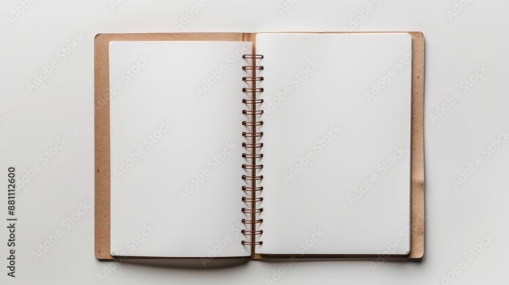 Top View Composition: The scene is captured from directly above, providing a clear view of the entire open notebook. This angle emphasizes the layout and design of the notebook's pages.

